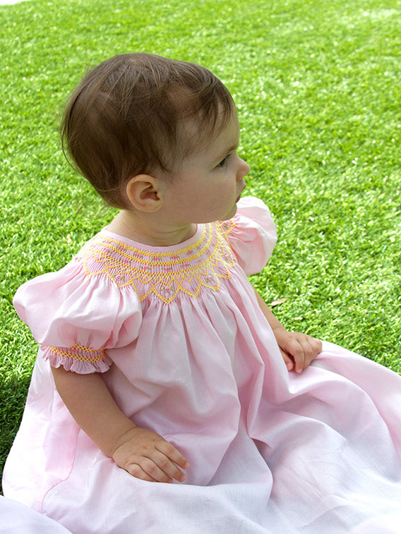 Girl's Pink Bishop Dress with Yellow Hand Smocking Girl's Pink Bishop Dress with Yellow Hand Smocking