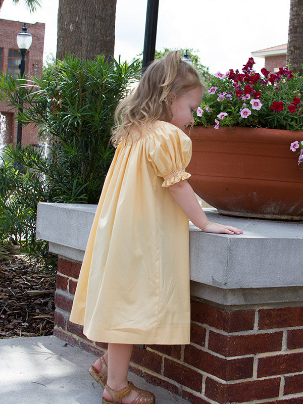 Girls Yellow Bishop Dress with Smocked Pink Hearts
