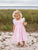 Girls pink smocked Easter dress with white eyelet flutter sleeves