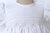 Beautiful classic white heirloom smocked dress for girls - Close up - embroidery