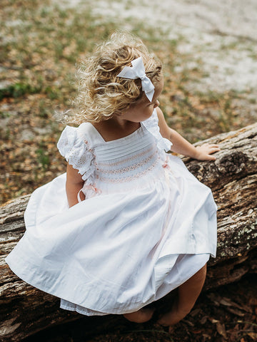 Beautiful Classic white hand smocked and embroidered summer spring everyday or special occasion dress for girls - pink embroidery, doily lace with pink detail trim and ribbon